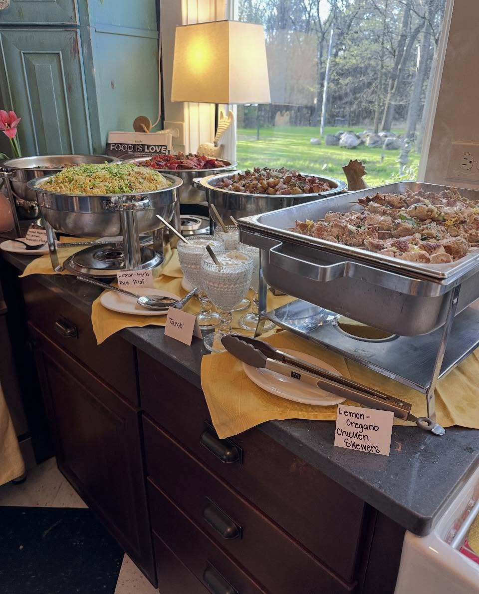 Sunnyside catering hot buffet with chicken skewers and rice